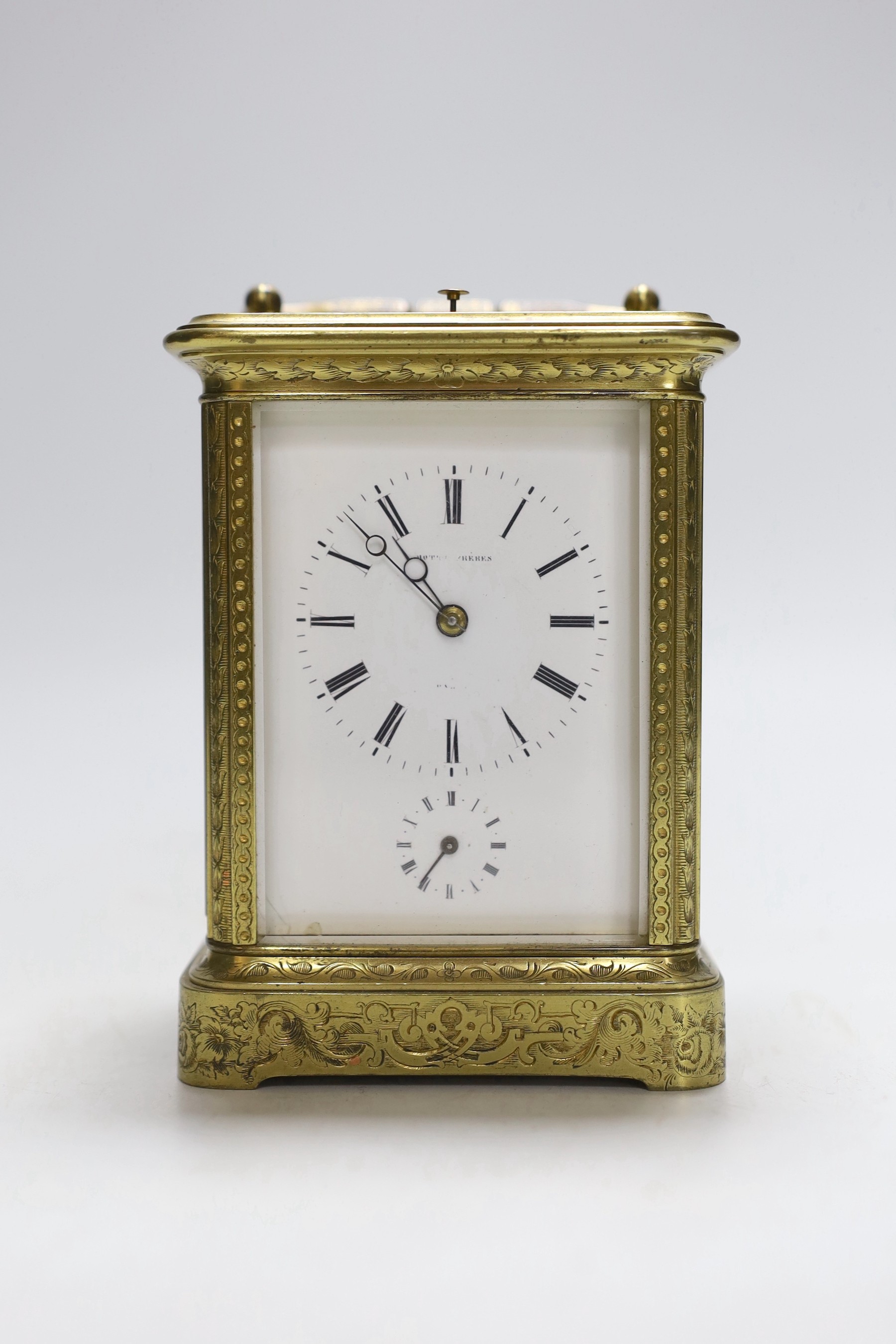 A late 19th century French engraved brass repeating carriage clock with alarm, signed Mottu Freres, Paris, 13cm high